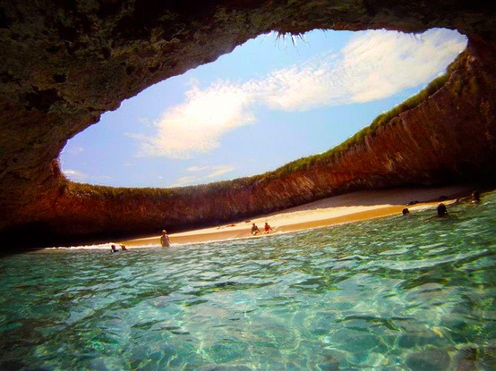 Photo:  The Marieta Islands where a water tunnel leads you to this hidden beach